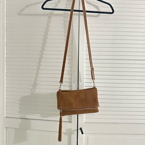 Roots Anna Clutch Tribe crossbody purse in brown leather